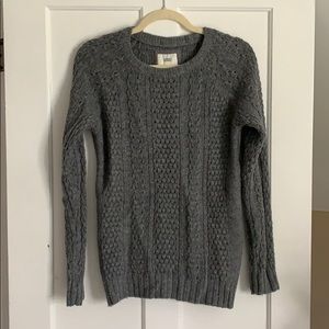 Oversized cable knit sweater.